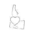 Idaho US state hand drawn pencil sketch outline map with the handwritten heart shape. Vector illustration Royalty Free Stock Photo