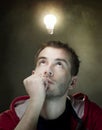 Idea bulb above mans head Royalty Free Stock Photo