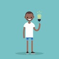 Idea Concept. Aha moment. Young smiling black boy is pointing Royalty Free Stock Photo