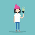 Idea Concept. Aha moment. Young smiling girl is pointing a finger on the light bulb / flat editable vector illustration