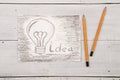 Idea concept - bulb drawn with pencil Royalty Free Stock Photo