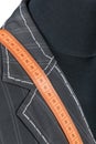 Manufacture of a tailor-made suit with a measuring tape on a bust Royalty Free Stock Photo