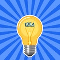 Idea concept with light bulb with blue rays Royalty Free Stock Photo