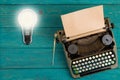 Idea concept- Vintage bulb and typewriter