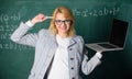 Idea on her mind. Digital technologies concept. Woman teacher wear eyeglasses holds laptop surfing internet. Educator