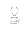 Idea and knowledge power, light bulb on book stack Royalty Free Stock Photo