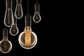 Idea and leadership concept Vintage incandescent Edison bulbs on