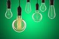 Idea and leadership concept Vintage incandescent Edison bulbs on Royalty Free Stock Photo