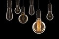 Idea and leadership concept Vintage incandescent Edison bulbs on Royalty Free Stock Photo