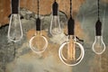 Idea and leadership concept Vintage incandescent Edison bulbs on Royalty Free Stock Photo