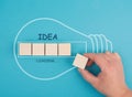 Idea loading, progress bar with a light bulb, starting a new business, development and growth concept, brainstorming for solution Royalty Free Stock Photo