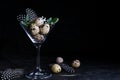 Idea of modern easter interior decoration. Quail eggs in cocktail glass on dark rusty background. Copyspace Royalty Free Stock Photo