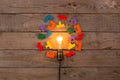 Idea and teamwork business concept, vintage incandescent light bulb and jigsaw on the wooden background Royalty Free Stock Photo