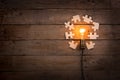 Idea and teamwork business concept, vintage incandescent light bulb and jigsaw on the wooden background Royalty Free Stock Photo