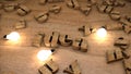 Idea word from wooden cubes, wood letters text string on table with light bulbs Royalty Free Stock Photo