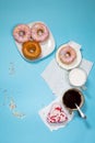 Ideal breakfast for the proper energy for the full day. Fresh coffee with milks and donuts . Hipster pictures. Top view Royalty Free Stock Photo