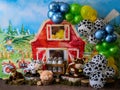 Little farm red with pets, white wooden fence with colorful balloons for photo studio love to crush the cake