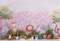 spring montage garden with animals and colorful flowers with light and dark wood for photo studio love to crush the cake