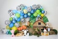 Custom farm animal decoration, colorful balloon arch, for first birthday