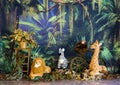 Safari riding with animals and green branches and colorful flowers for photo studio