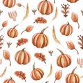 Autumn-themed watercolor seamless pattern consists of dried flowers, fallen leaves and ripe pumpkins.