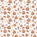 Autumn-themed watercolor seamless pattern consists of dried flowers, fallen leaves and ripe pumpkins.