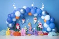 Personalized decoration with colorful balloon arch, under the sea with sharks, for first birthday