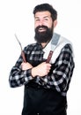 Ideal professional tool set. Happy hipster holding stainless steel tools. Bearded man with barbecue tools in hands Royalty Free Stock Photo