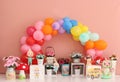 Personalized romantic decoration with colorful spring house and vases for first birthday