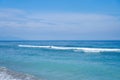 An ideal untouched ocean beach with clear, calm turquoise water