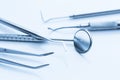 Dentist basic cutlery instruments mirror sonde tweezers Royalty Free Stock Photo