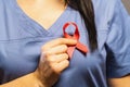 Doctor Hands Holding Pink Cancer Awareness Ribbon Royalty Free Stock Photo