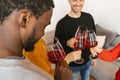 Happy friends having fun and drinking wine - Friendship concept with young people enjoying harvest time together at farmhouse Royalty Free Stock Photo