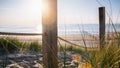 Path at Baltic sea over sand dunes with ocean view, sunset summer evening Royalty Free Stock Photo