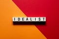 Idealist word concept on cubes