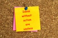 ideas without action are useless postit on cork Royalty Free Stock Photo
