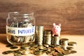 An ideas of saving money for the future with coins and piggy bank Royalty Free Stock Photo