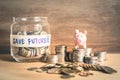 Ideas of saving money for the future with coins and piggy bank Royalty Free Stock Photo