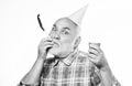 Ideas seniors birthday celebrations. Elderly people. Man bearded grandpa with birthday cap and drink cup. Grandfather Royalty Free Stock Photo