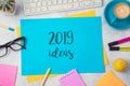 2019 ideas text on colorful paper memo note with business office