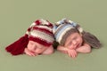 Identical twin babies with hats Royalty Free Stock Photo