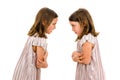 Identical twin girls sisters are arguing yelling at each other Royalty Free Stock Photo