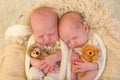 Identical twins with toys Royalty Free Stock Photo