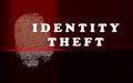 Identity theft concept with thumb print and scanner lights Royalty Free Stock Photo