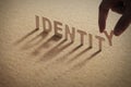 IDENTITY wood word on compressed board Royalty Free Stock Photo