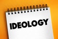 Ideology a system of ideas and ideals, especially one which forms the basis of economic or political theory and policy, text Royalty Free Stock Photo