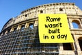 Idiom Rome wasn't built in a day postit Colosseum