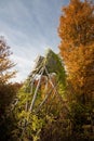 Idle hide with autumn tree