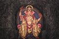 Idle of lord ganesha on cave background
