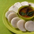 Idli with Sambar in bowl on green background, Indian Dish Royalty Free Stock Photo